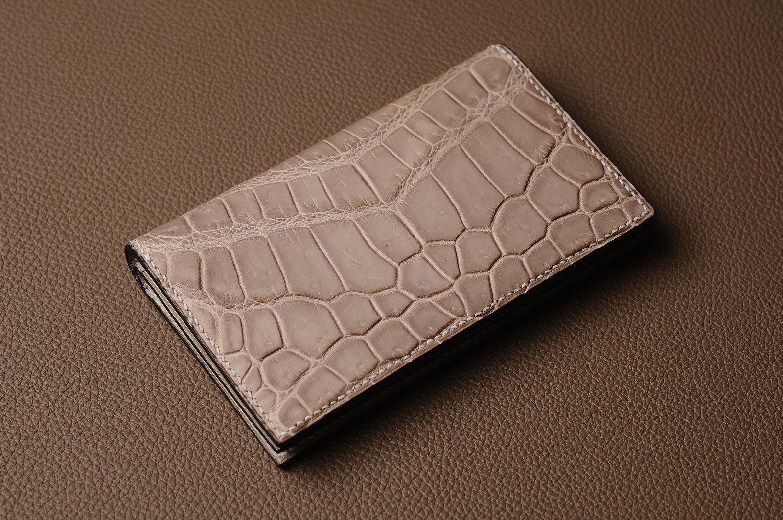 Custom leather card holder showing its pocket layout and edge finishing