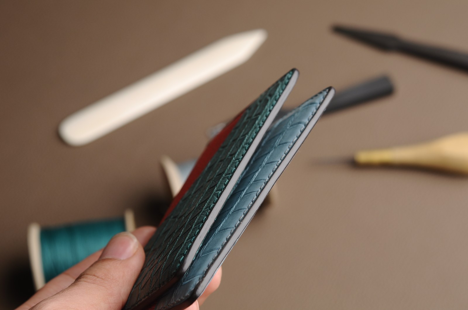 Card holders showing layered edges and finished thickness